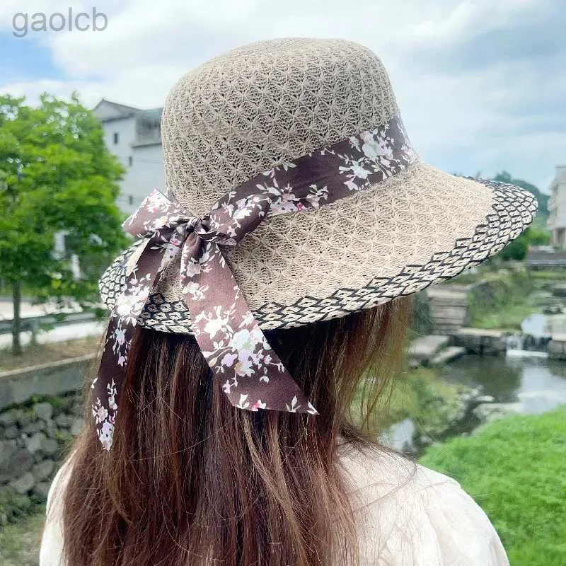 Breda randen hattar hink hattar vintage kvinnor stråhatt elegant blomma båge band sol hatt sommar resor solskydd bred brim hatt 24323