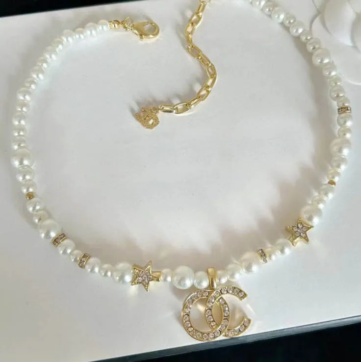 Collier de perles Designer étoile timbre pendentif collier de luxe Couple famille bijoux accessoires exquis cadeau fête d'anniversaire cuivre bijoux de fête de mariage