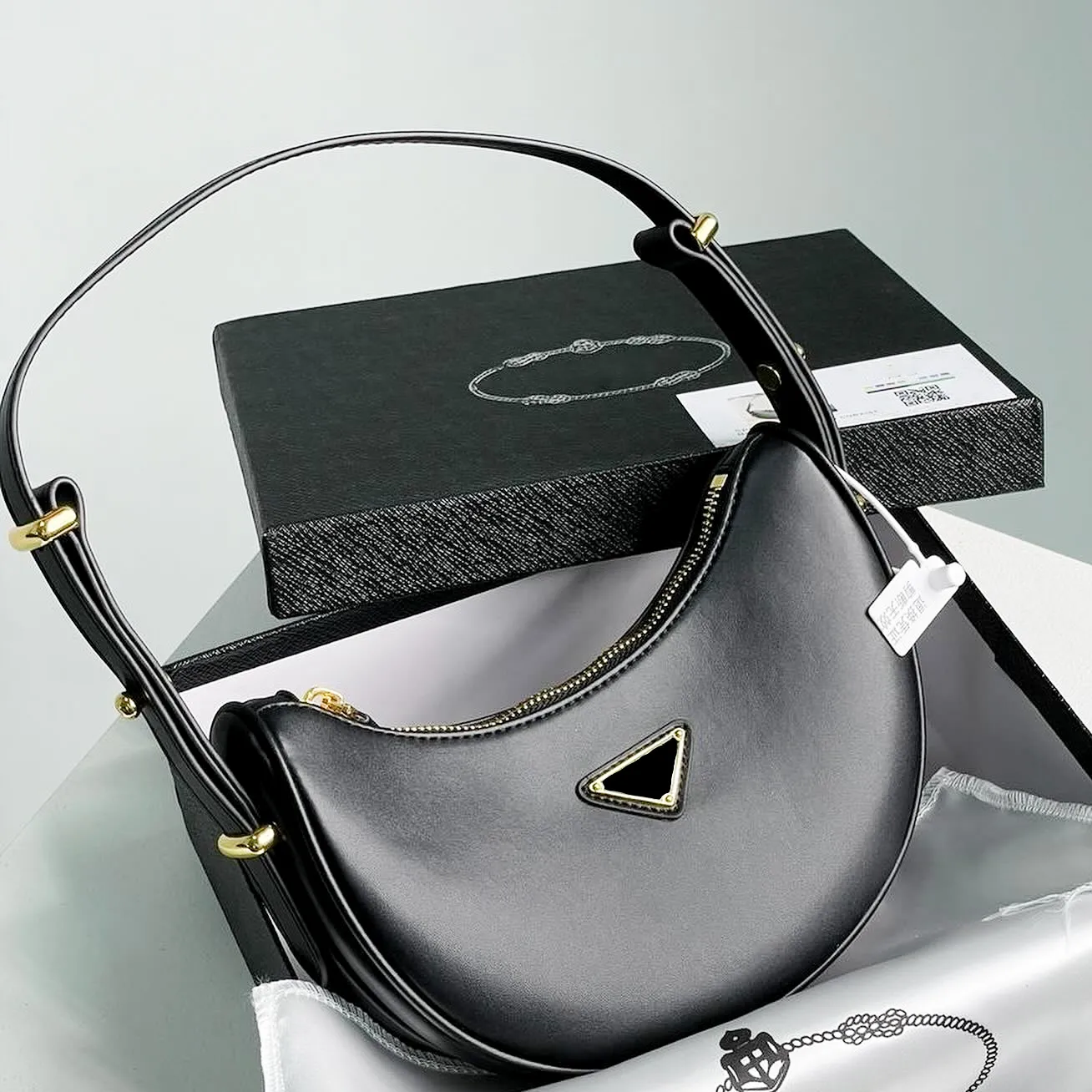 Дизайнерская сумка высшего качества, роскошная сумка через плечо, клатч в форме полумесяца для женщин, мужская сумка под мышками, даже треугольные сумки, модные женские крутые белые кожаные сумки на ремне