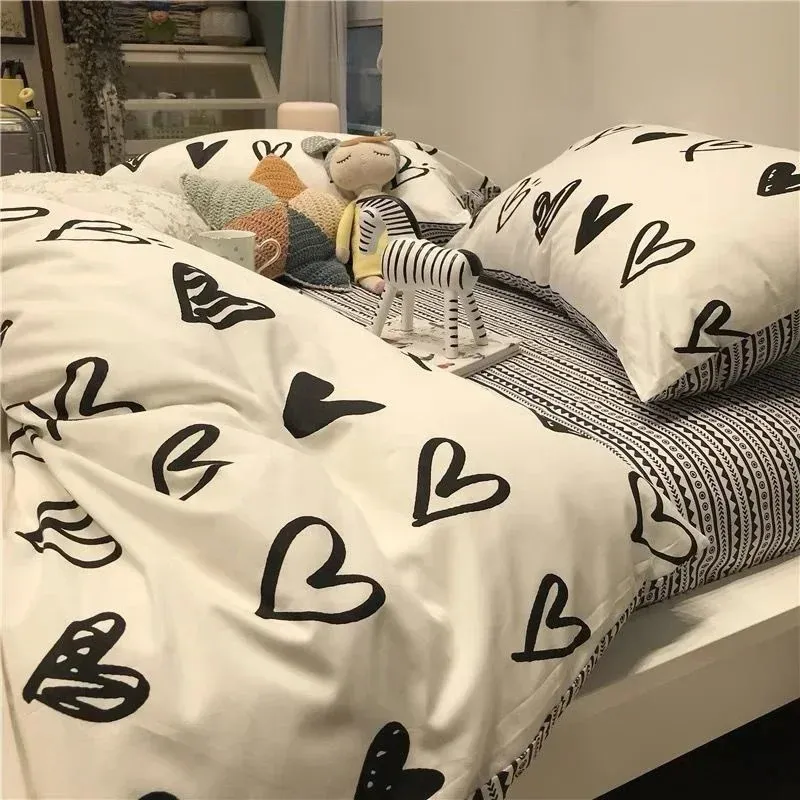 Set biancheria da letto per la casa europea Ins Loving Heart Set copripiumino morbido semplice con copripiumino lenzuolo piatto Federe Biancheria da letto 240322