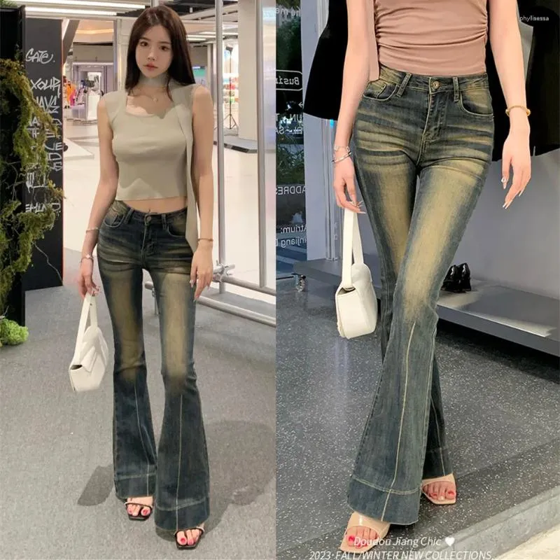 Kvinnors jeans flickor mode hög midja kvinna kläd damer casure streetwear lim-fit denim byxor kvinnliga vintage klockbotten 7835