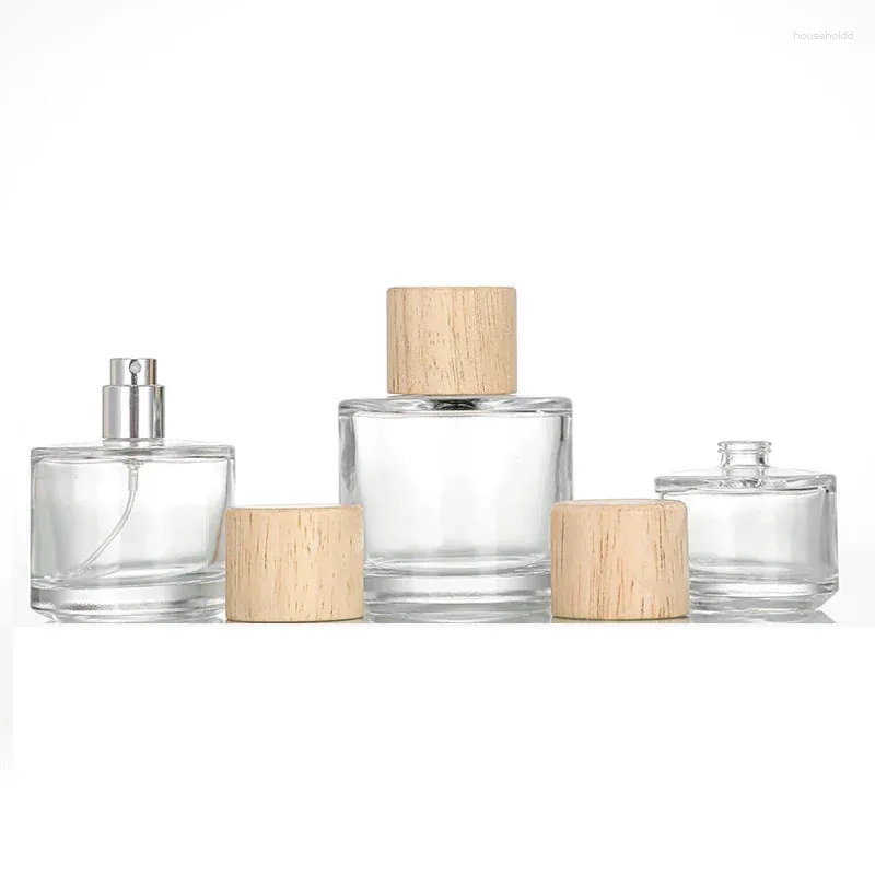 Bouteilles de stockage 5pcs Bouteille de pulvérisation sans sertissage Couvercle en bois 30ml 50ml 100ml Distributeur de parfum en verre transparent Maquillage vide Brume fine