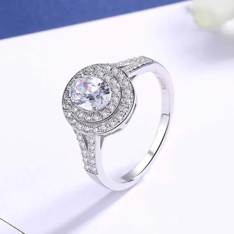 Yinli nouveau produit blanc cuivre plaqué or blanc ovale Pigeon oeuf bague édition coréenne lumière luxe diamant proposition bague pour les femmes