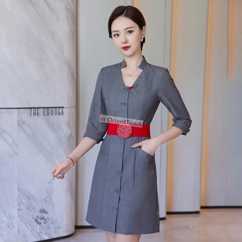 Women's Gray Dress with Red Belt and Red Lipstick
