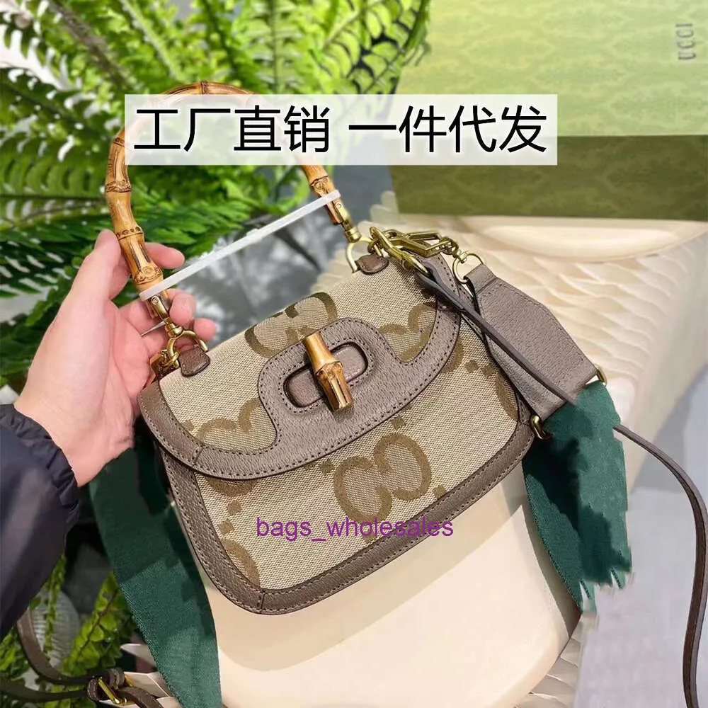 The factory design bag handbag Bag Flower Womens Law Stick Moon Teeth Wealth Bucket Ox Horn Love Saddle