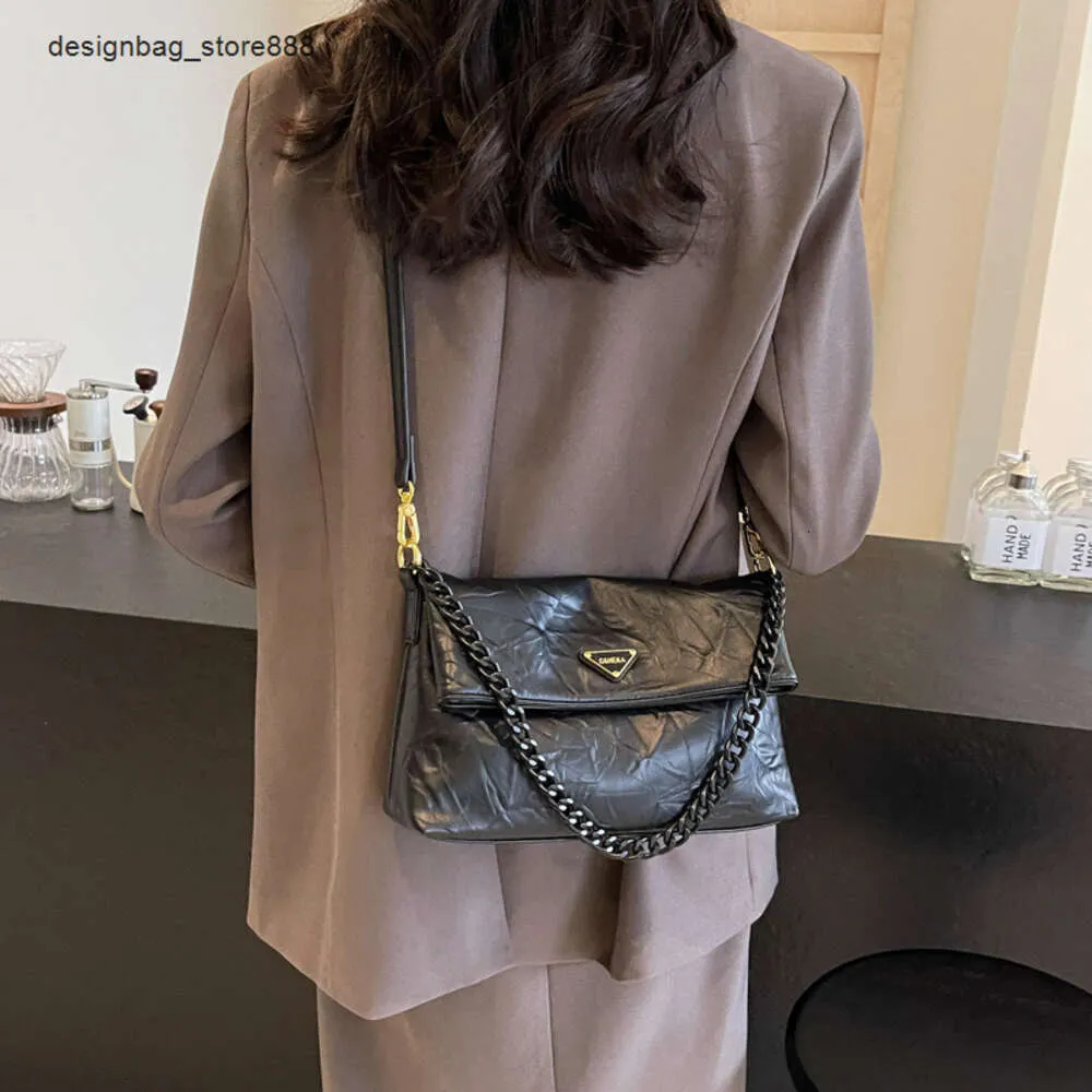 Omuz çantası markası indirim kadınlar moda el tutma desen koltuk altı küçük kare yeni trend çok yönlü tek omuz crossbody kadın