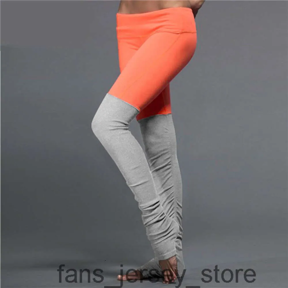 Les tenues de yoga haute taille purgent les leggins sportifs de fitness de ruissellement des pantalons élastiques élastiques