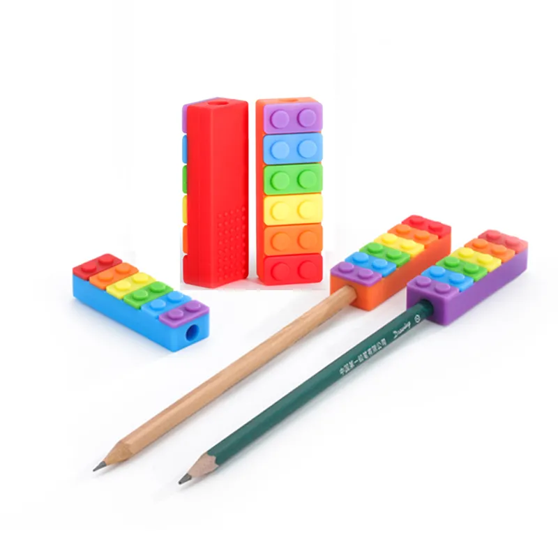 Nouveau crayon à croquer Toppers coloré arc-en-ciel morsure crayon capuchon FDA sûr Silicone dentition jouet sensoriel pour enfants enfants jouets de dentition à mâcher