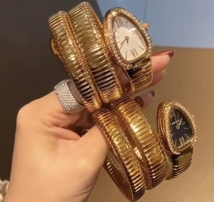 Классические браслеты Женщины смотрят наручные часы Золотой Змеи.