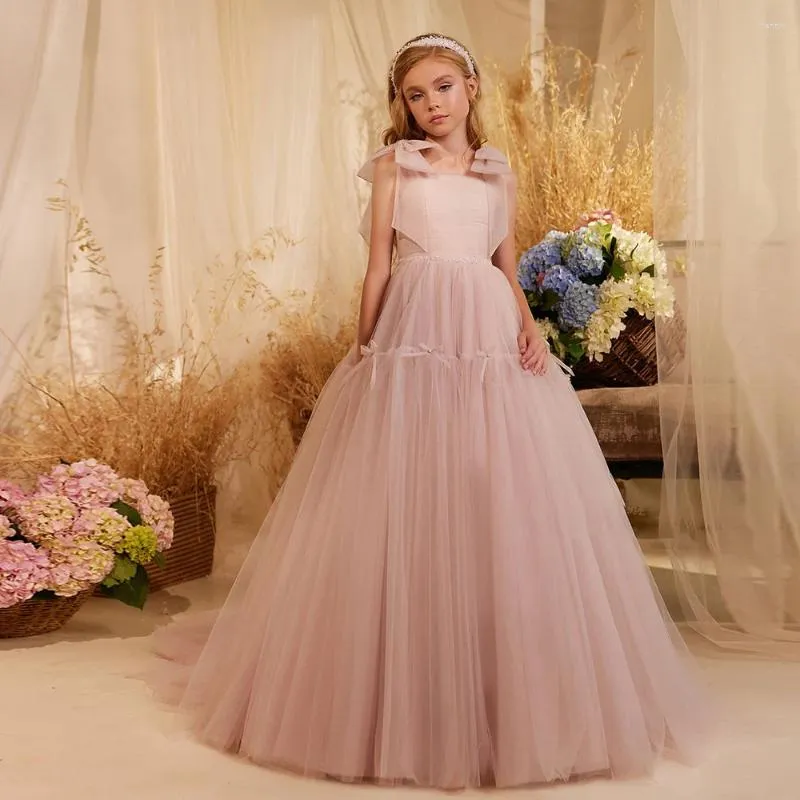 Flickaklänningar 2024 Pink Tulle Flowle Dress for Wedding Suspenders Bow Floor Length Söta barn födelsedagsfest prinsessor bollklänningar