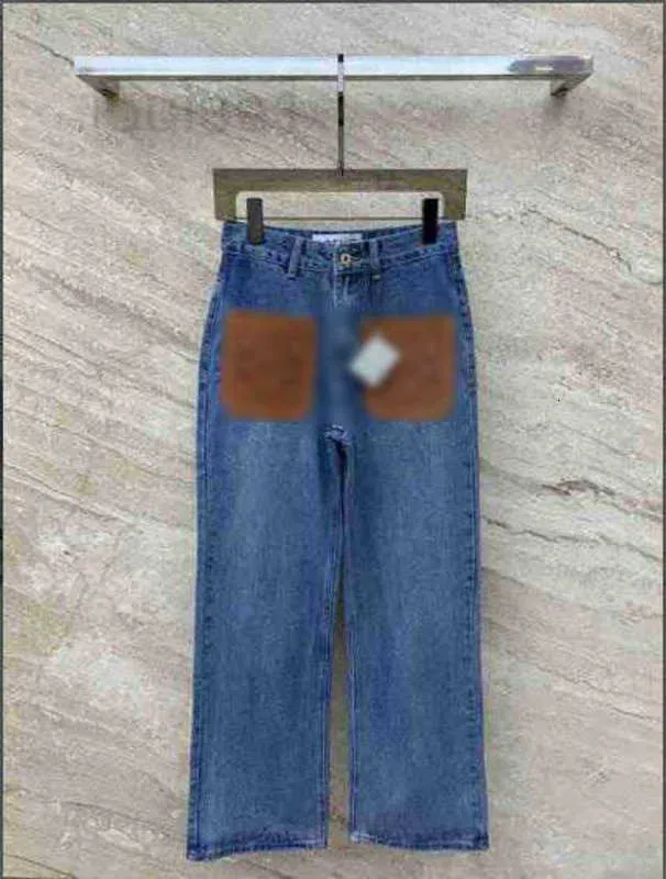 Designer di jeans da donna Nuovissime tasche in pelle scavate per pantaloni in denim.i pantaloni anteriori doppi con design sono semplici, alla moda e dimagranti TIHU