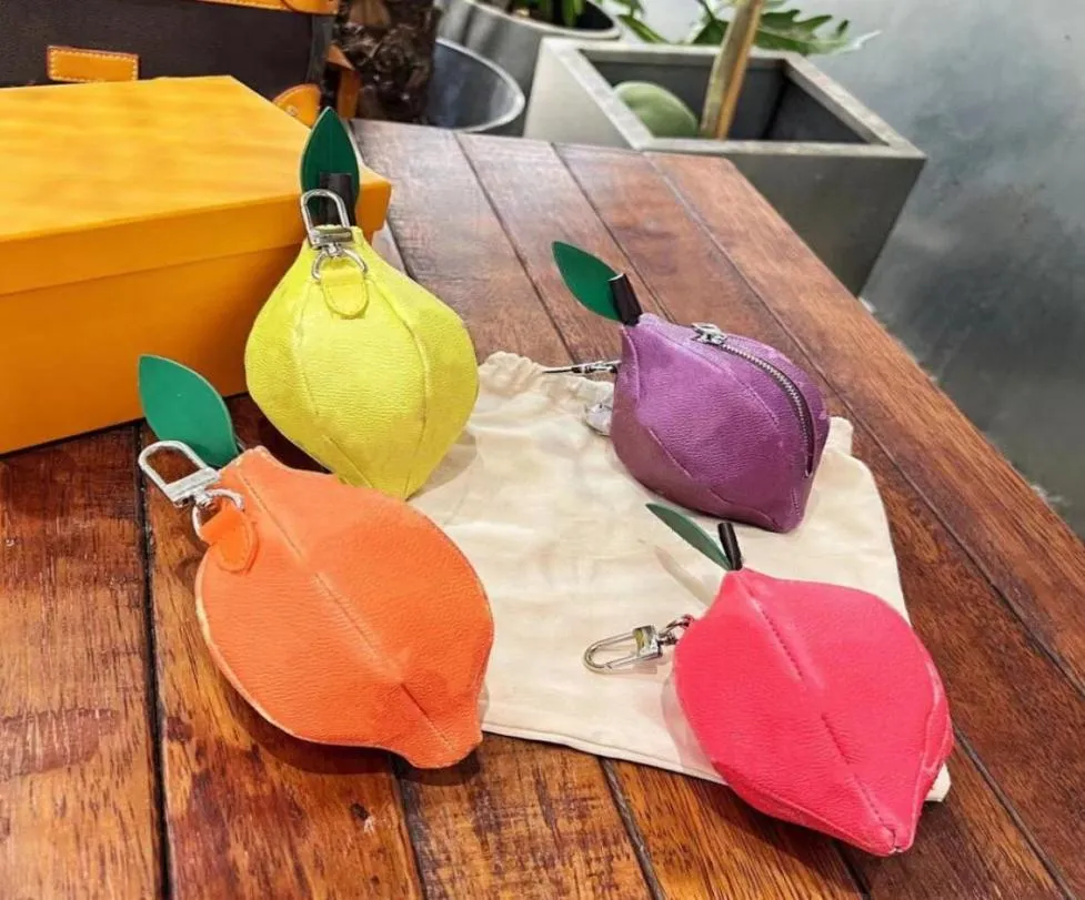 Nieuwe stijl Fashion Lemon Pendant Coin portemonnees Unisex Designer Accessoires Key Chain Change Purse Turn Classic Printing Leather Handtas CA3952663