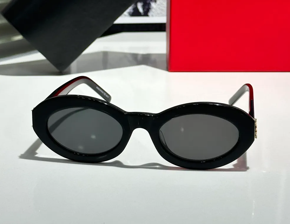 نظارة شمسية بيضاوية M136 الأسود العدسات الرمادية الداكنة للنساء صيف شمس Sonnenbrille أزياء أزياء UV400 نظارات
