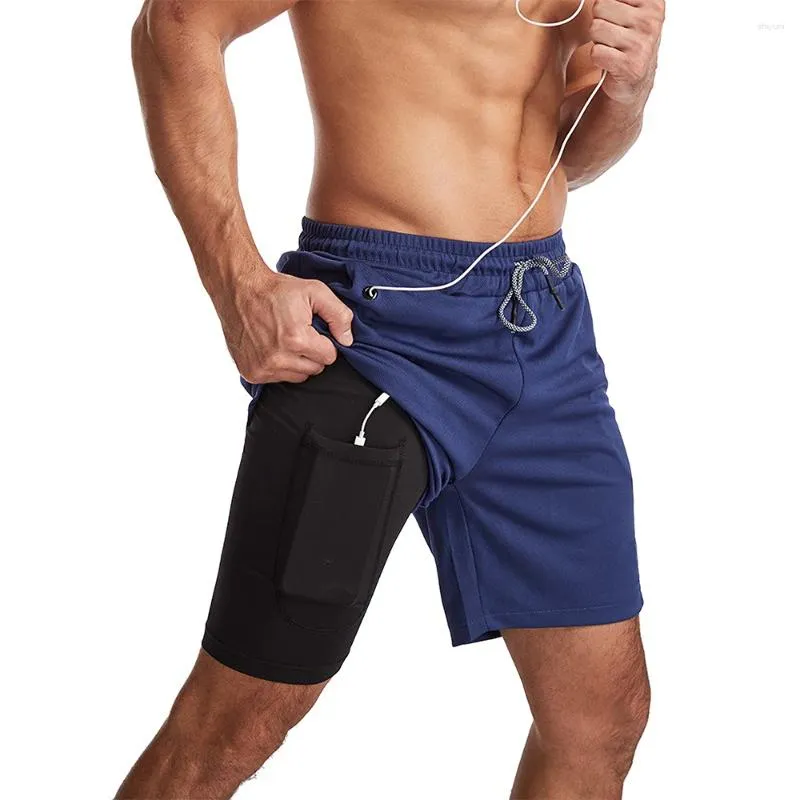 Mäns shorts 2024 Sport män sportkläder dubbeldäck som kör 2 i 1 strandbottnar sommar jogging korta byxor med blixtlåsfickor