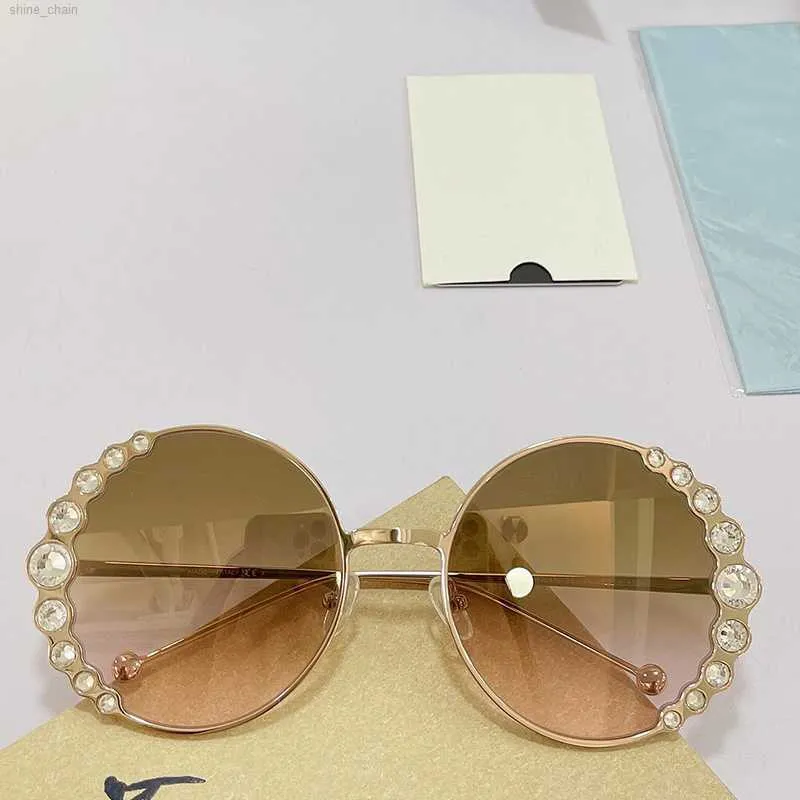 Occhiali da sole da donna di design 0324S Montatura rotonda in filo d'oro con decorazione di diamanti Moda da donna Occhiali da sole di marca di lusso Festa di compleanno Shopping UV400 Con scatola