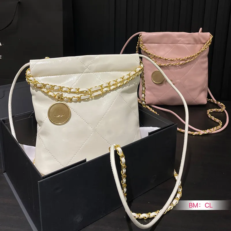 Design alla moda Mini sacco per immondizia splendidamente decorato Tendenza da donna Big Bang Borsa a doppia catena a campata singola Borsa di design sotto le ascelle in pelle di grande capacità 20 cm