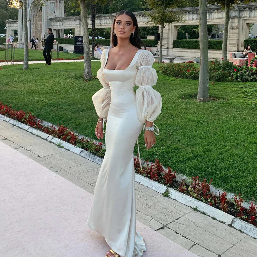 エレガントオフマーメイドシャロンは、パフスリーブ付きの白いイブニングドレスドバイアラビア語の女性ウェディングドレスパーティーGOWS SF021 ES
