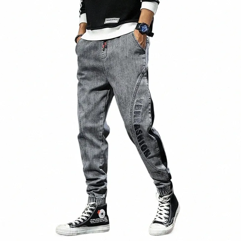 Męskie dżinsy 2022 Spring Grey Denim Pants Joggers Estee workowate wołanie bok patchwork elastyczne wiat men dżinsy homme e1gd#