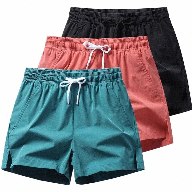 Casal Quick Dry Running Sports Beach Shorts 2024 Verão Homens Sólidos Cintura Elástica Fitn Gym Calças Mulheres Trouers Tamanho Grande 4XL d3Gw #