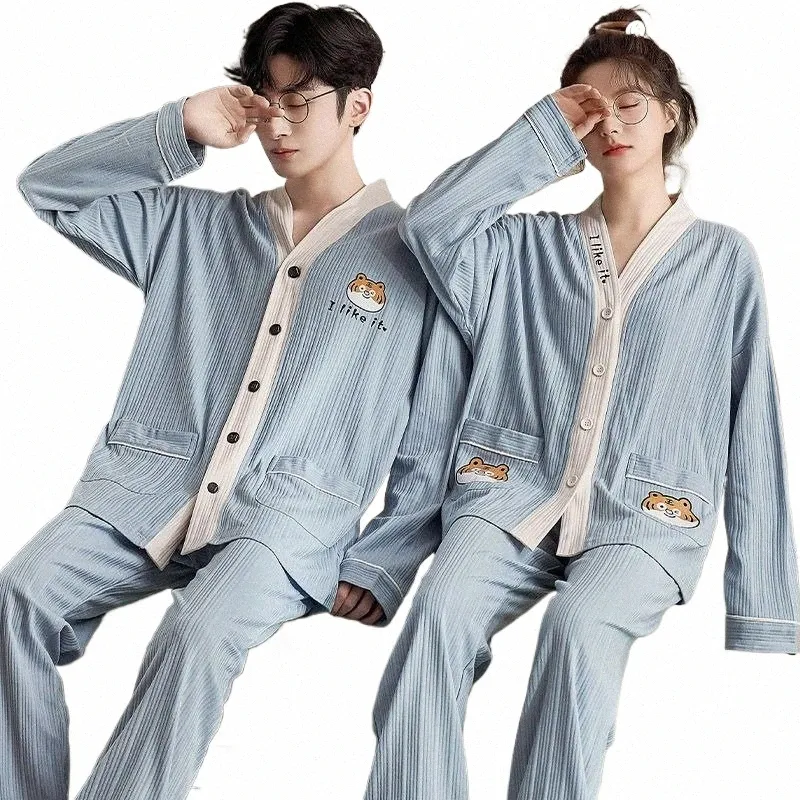 2024 Nueva primavera otoño pareja pijamas sueltos casual ropa de hogar hombres y mujeres con cuello en v ropa de dormir conjunto azul color sólido pijamas impresos 68LX #