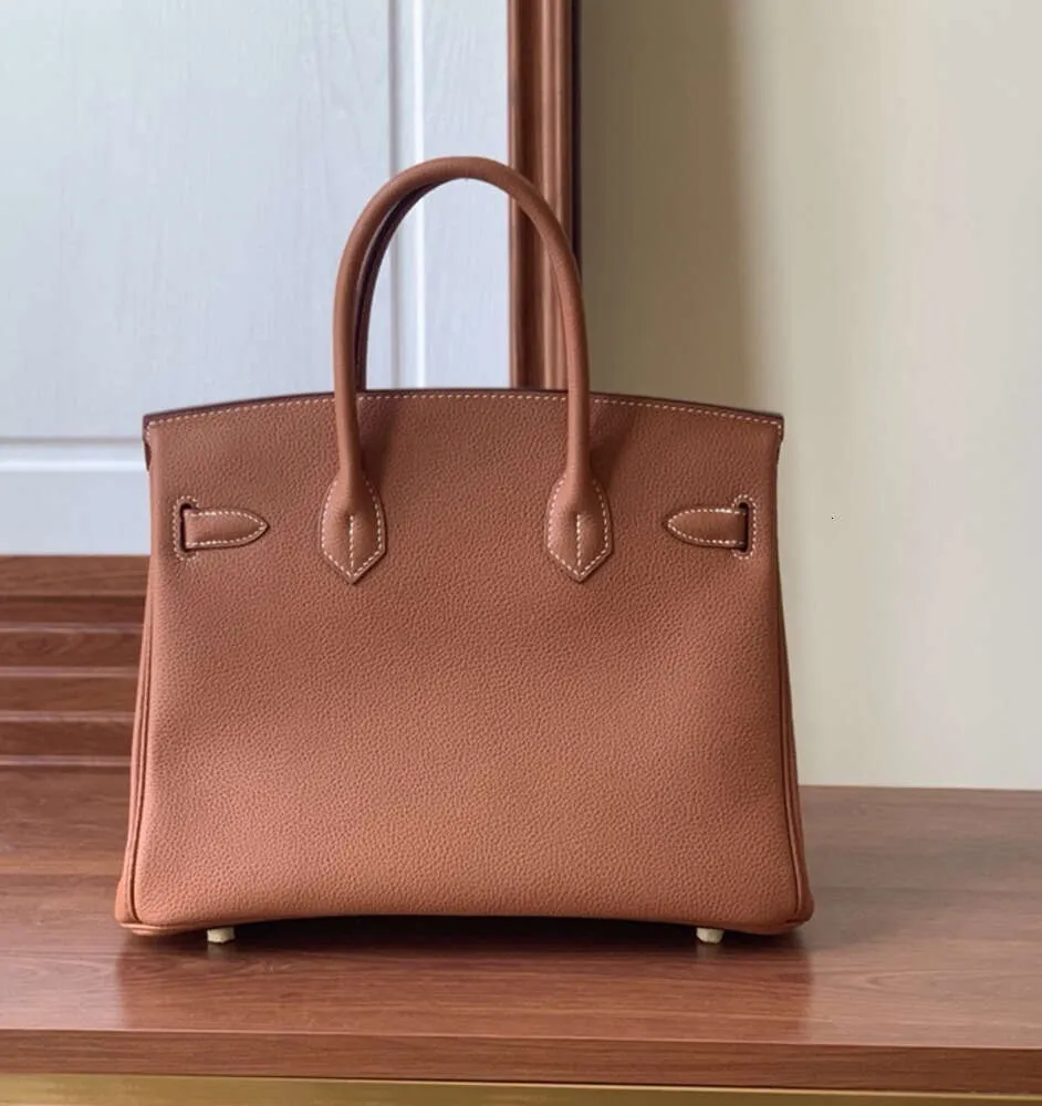 10a en kaliteli çanta kadın çanta tasarımcı çanta tote çanta altın gümüş metal el yapımı lüks tasarımcı çanta klasik moda togo deri cüzdan pochette debriyaj