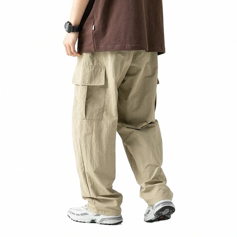 Primavera verão masculino 2023 novas calças de carga multi-bolso masculino casual cor sólida em linha reta baggy calças de perna larga masculino s8tS #