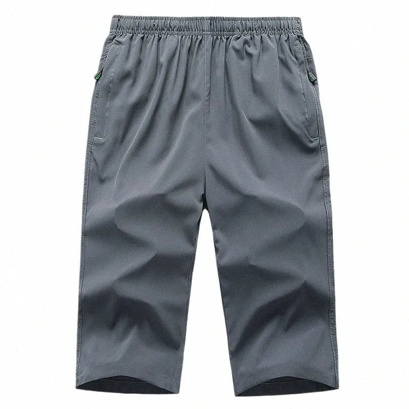 swobodne męskie spodnie cielęce Pants Mężczyźni Summer Mens Beach Krótkie spodnie Krótkie spodnie Homme Brand Ubranie Szybkie suche sport 97 O0CH#