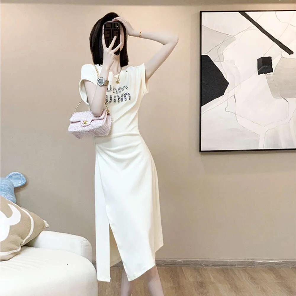 French Style Dress Women in Summer Pleated Waist and Belly Covering for Slimming Effect. Mid Length Slit T-shirt Skirt with A Luxurious Texture