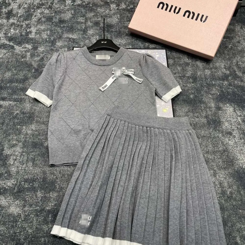 Mm Early Spring New Fashionable Embroidered Letter Temperament College Style Short Sleeved Top Short Skirt Set