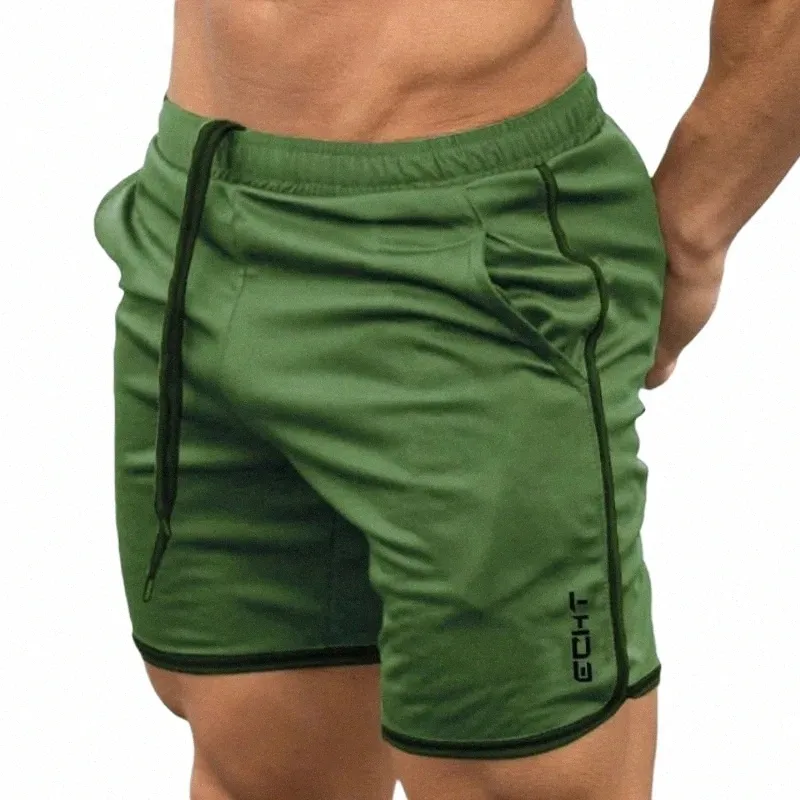 Zomer Mannen Sport Running Shorts Training Voetbal Tennis Workout GYM ademend Sneldrogend Outdoor Jogging Mannen Elastische Shorts X5St #