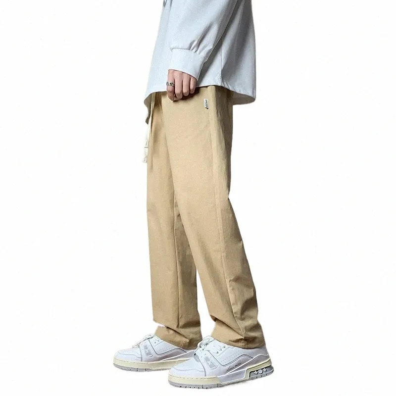 Pantalones casuales de gran tamaño para hombres Simplicidad Pantalones de color caqui sólido Cott Pantalones holgados con cordón para adolescentes Pantalones rectos clásicos X2nx #