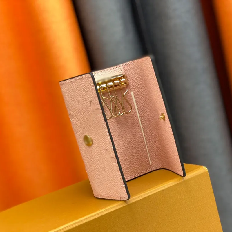 Sac de clé de concepteur Mini portefeuille de luxe rose gaufré femmes carte clip pochette six boucles serrure à clé couvercle rabattable porte-monnaie court fente pour carte d'identité porte-clés avec boîte