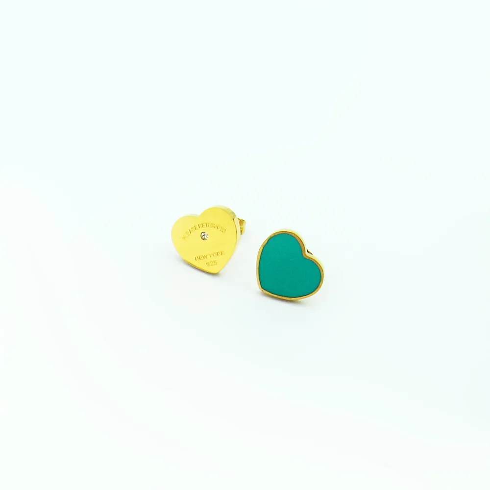 10-year-old factory wholesale 316L stainless steel heart-shaped brand titanium earrings couple gifts with dust bags.