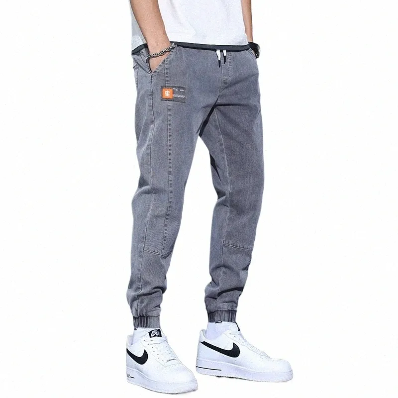 2023 nuovi uomini allentati Harlan Strap Denim pantaloni casual versatili Fi Baggy Jeans per gli uomini Streetwear N206 #