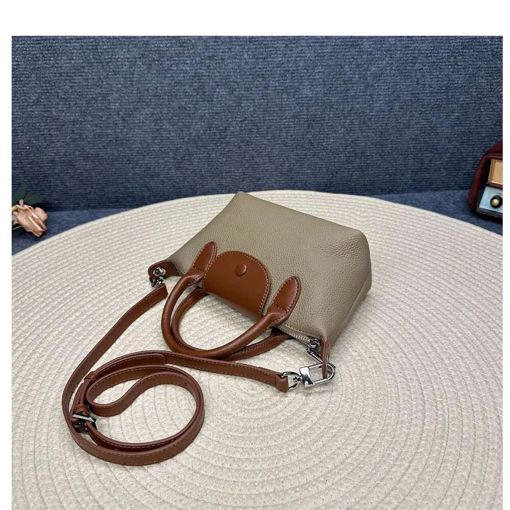 Sac à épaule d'usine Store Livraison gratuite Nouvelle vache pour femmes Crossbody Crossbody Geatic Le cuir boulet à main Smallo7u5