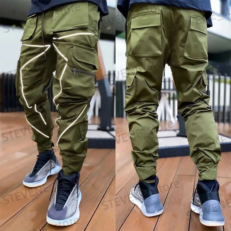 Męskie spodnie 2022 Autumn Nowe spodni swobodne Mens High Strt Hip-Hop Personality Trendowe kombinezony luźne spodnie odblaskowe T240326