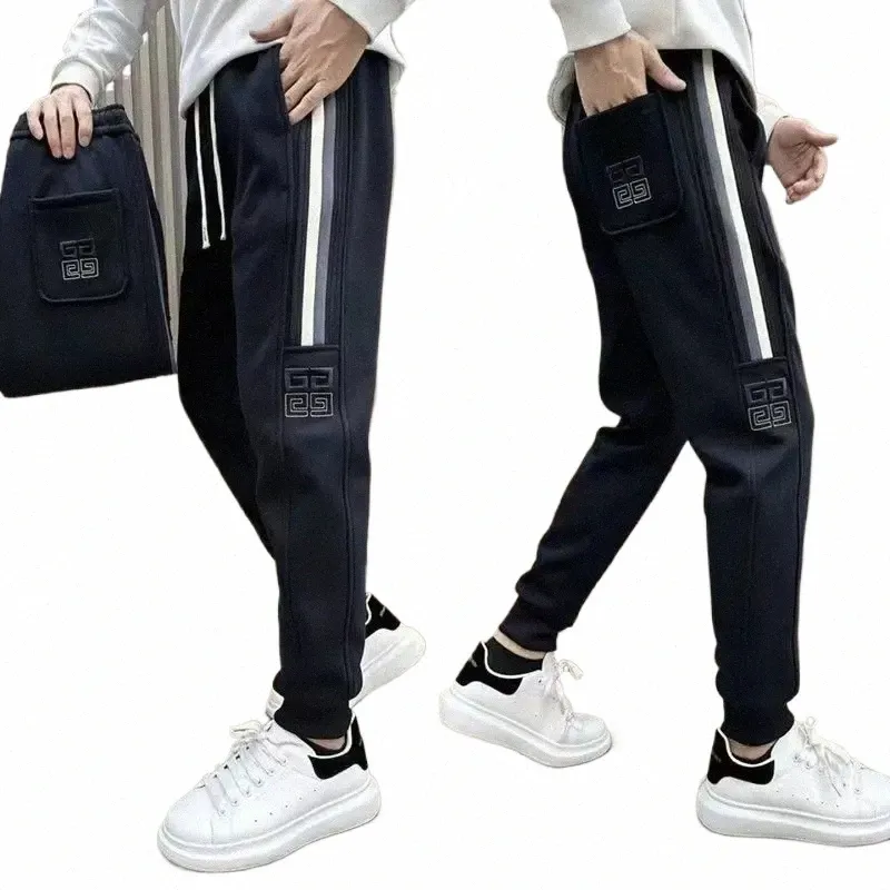 jesienne zimowe joggery na zewnątrz spodnie sportowe czarne białe paski ciasne spodnie Fi streetwear High -Quality Clothing L4M6#
