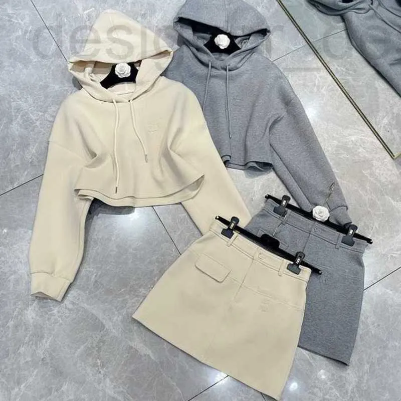 Two Piece Dress designer brand Early spring new MIU high-end casual and age reducing embroidered hoodie with a half skirt set TQJB