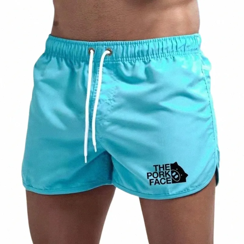 2023 Nya herrstrandshorts Summer Men's Swimewear Sexiga badstammar Herrarna Löpande shorts Sea Surf Shorts Sport K4QI#