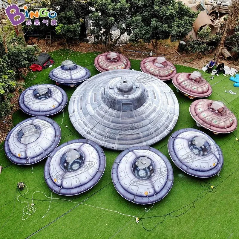 7m de diámetro (23 pies) con modelos de ovnis hechos a medida de soplador Decoración del tema del espacio de la nave espacial inflable para el evento publicitario con los juguetes de ventilador de aire deportes