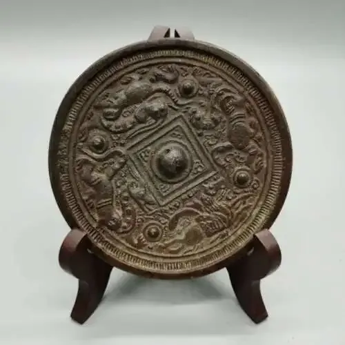 Le sculture raccolgono la Cina Bronzo Antico Quattro Dio Bestia Esorcizzare gli spiriti maligni Specchio in bronzo