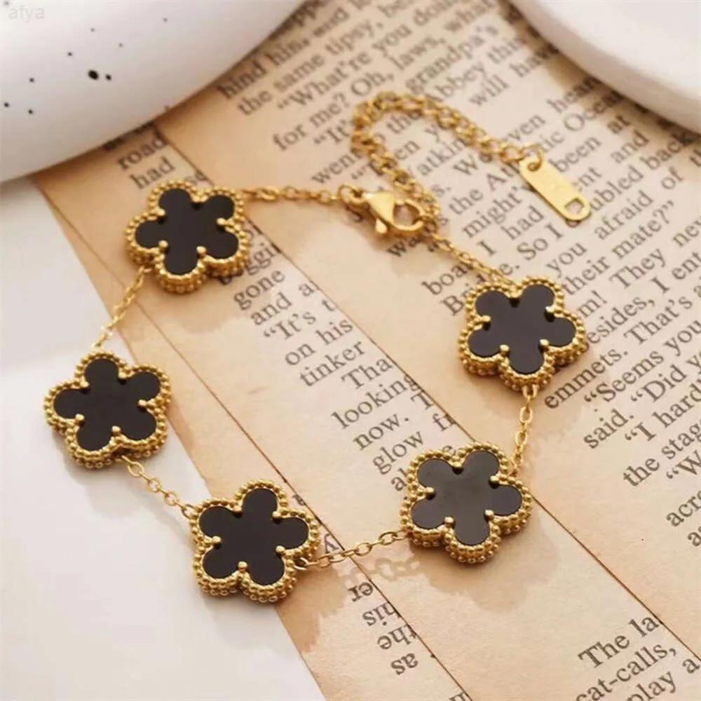 Doppelseitiges Kleeblatt-Armband aus 18-karätigem Gold mit fünfblättriger Blume