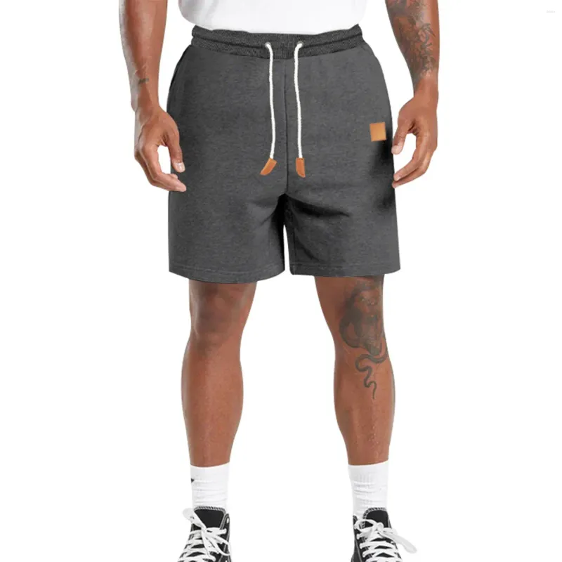 Shorts maschile estate lunghezza del ginocchio di colore solido pantaloni gambe dritti elastica sport casual per studente