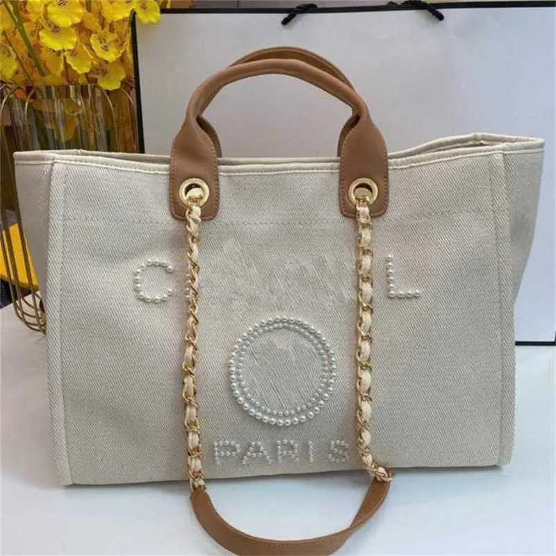 Grande capacità di fabbrica al 70% Outlet di borse classiche da donna Borse a mano in tela Zaini da spiaggia Borsa Tote Piccole catene a tracolla Grande tracolla P327 in vendita