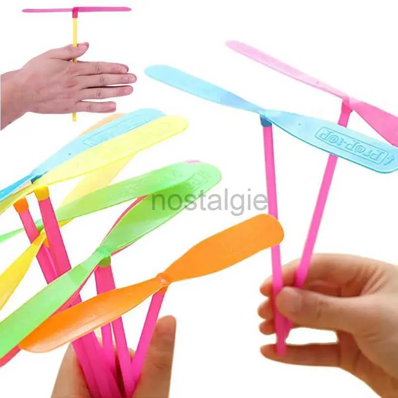 Intelligence toys Plastic Bamboo Dragonfly Shape Hand Push Flying Propeller Outdoor Sports Game Kids Toy Gift Rotating Arrow Games 24327