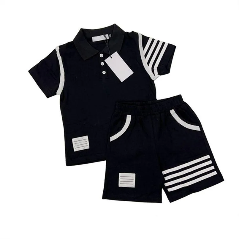 Set di abbigliamento Designer Baby Bambini Magliette Pantaloncini Bambino Ragazzi Ragazze Set vestiti Estate Bianco Nero Tuta di lusso Tuta sportiva per giovani R02 Dhlth