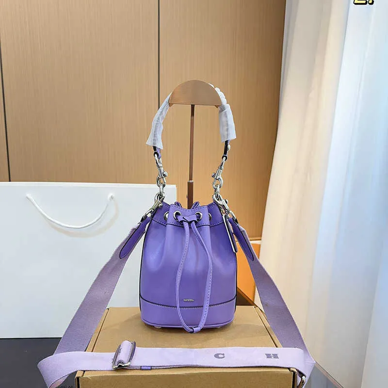 DHgate Purple Designer Handbag Elegant Crossbody Bag for Women Stylish Tote Bag for Beach 240327 Bags Luggage Accessories
