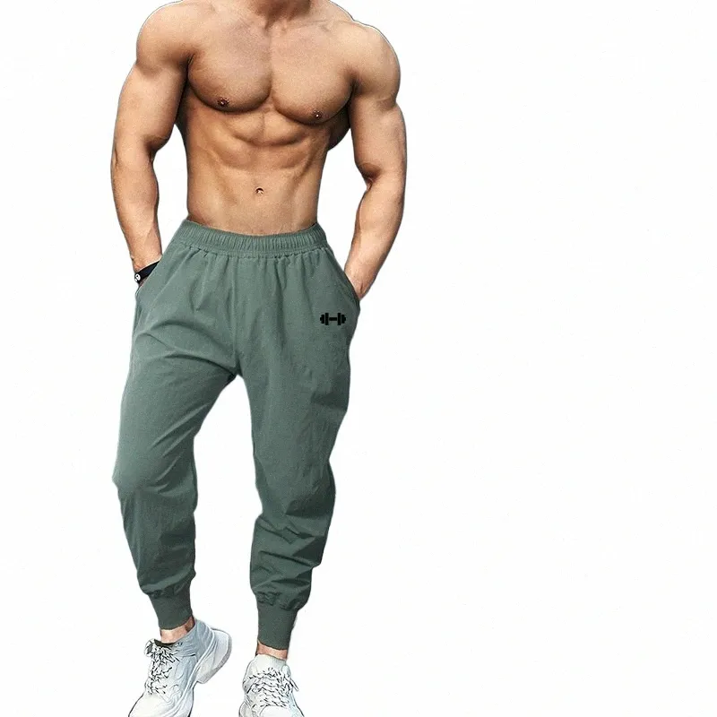 Pantalon de jogging pour hommes Pantalon de survêtement d'haltère d'été Streetwear Fitn Survêtement Pantalon de jogging Hommes Vêtements de sport Pantalon de sport musculaire X8Gz #