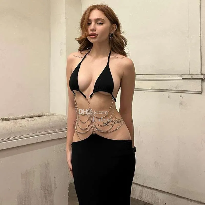 Kvinnans vårpersonlighetsklänning Avantgarde Solid Color Hanging Neck Deep V Breast Leakage Metal Chain Splicing Big Backless Dresses