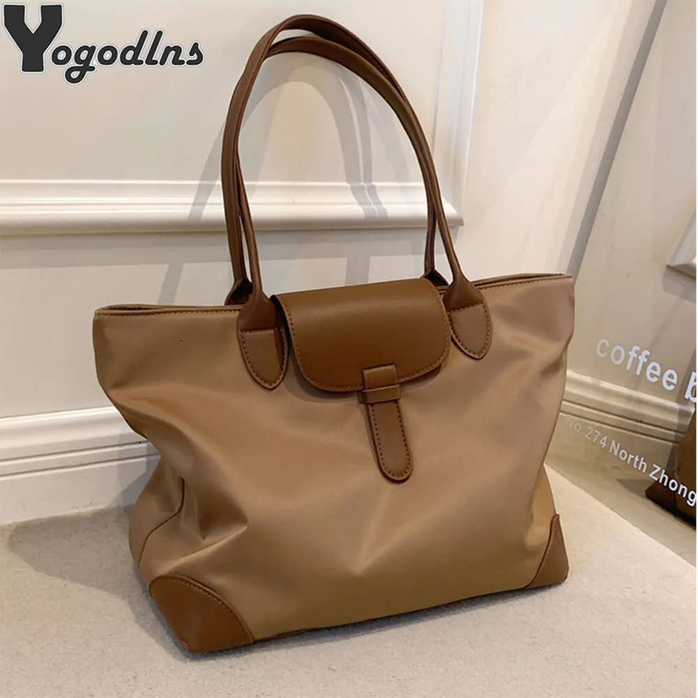 Bolsa de ombro de fábrica Loja Frete Grátis Oxford Tecido Sacos nas axilas para mulheres Luxo Digner Bolsa Grande Capacidade Shopper Tot Viajando Laptop